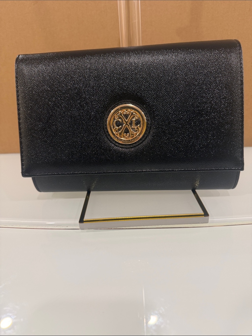 Black Leather Crossbody Bag with Gold Logo Accent